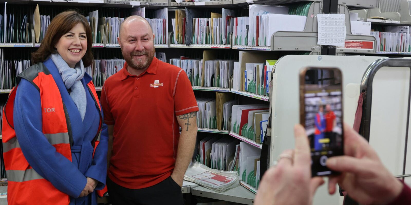 Lucy Powell MP with Royal Mail Worker, December 2024